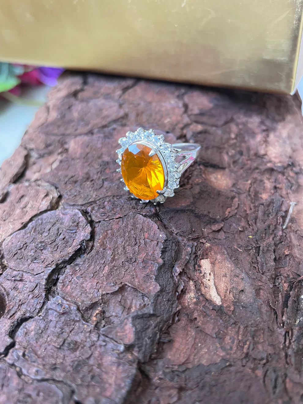 Oval sunset citrine stone cocktail design silver ring